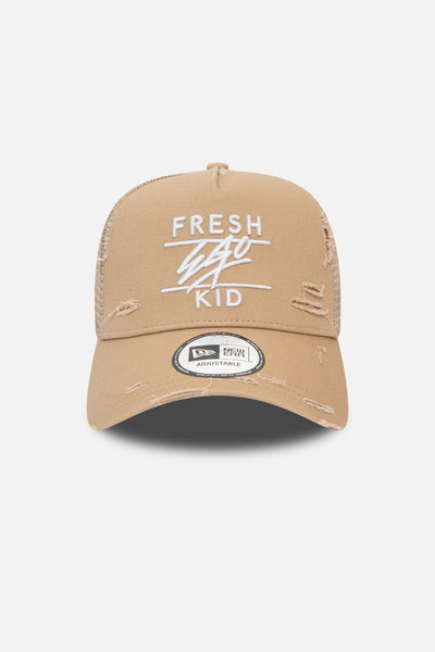New Era distressed mesh trucker tan