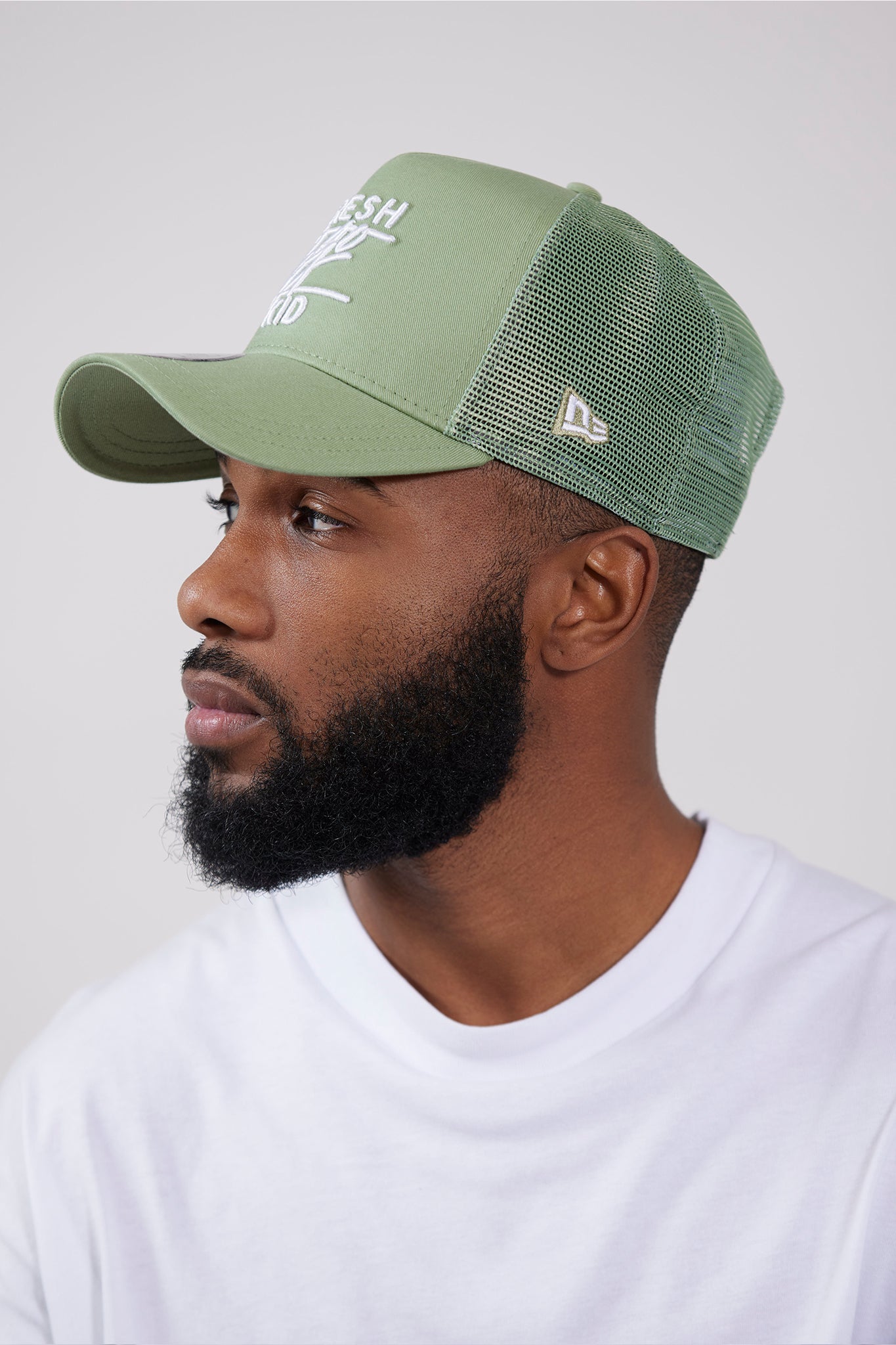 Fresh Ego Kid New Era pastel green trucker