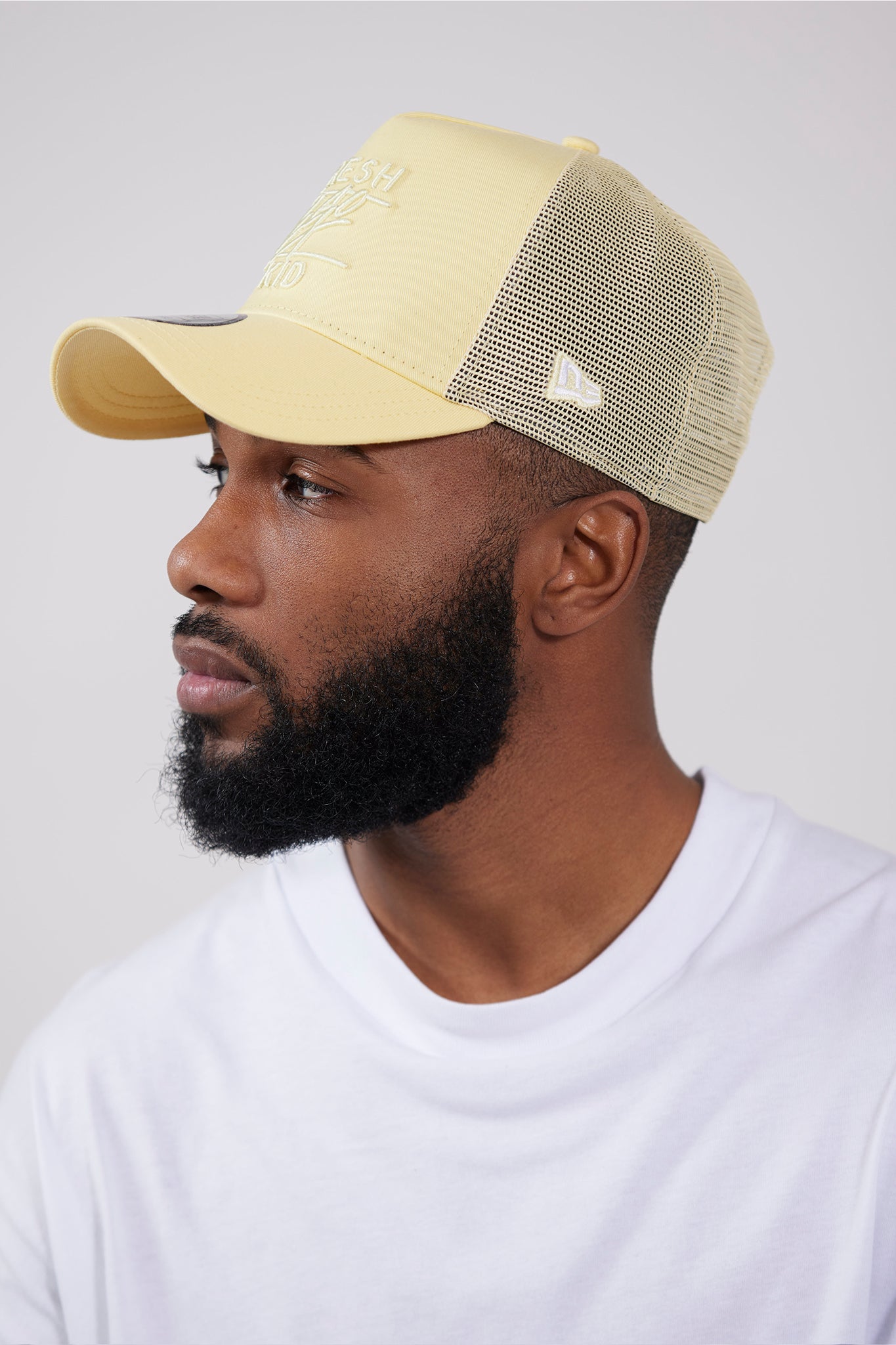 New Era mesh trucker yellow