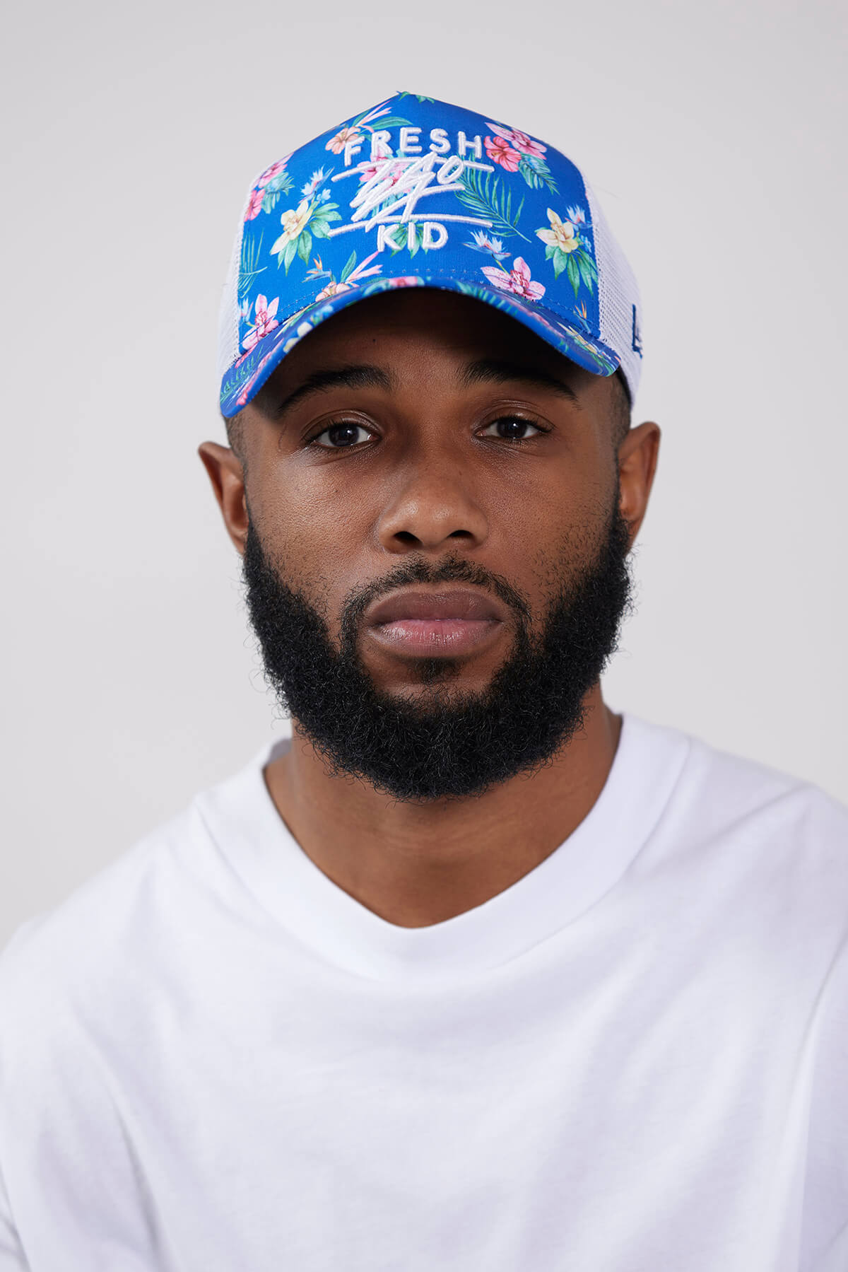 Fresh Ego Kid New Era flower print trucker in blue
